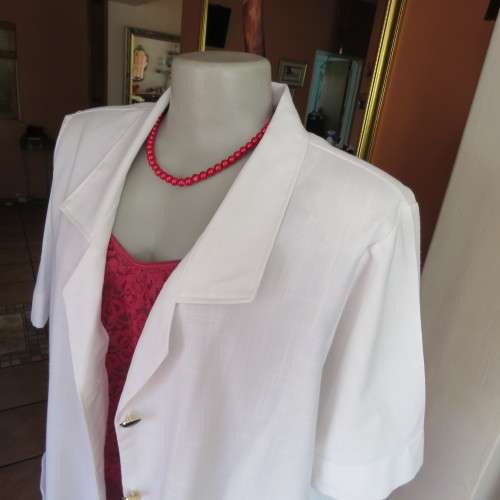 Smart white short sleeve summer jacket with button down front. Size 46 to 48. New condition.