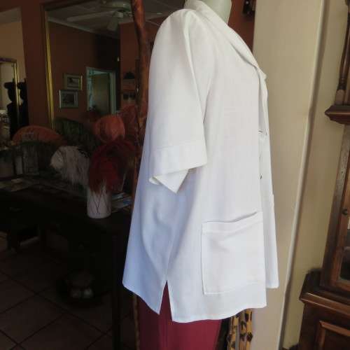 Smart white short sleeve summer jacket with button down front. Size 46 to 48. New condition.