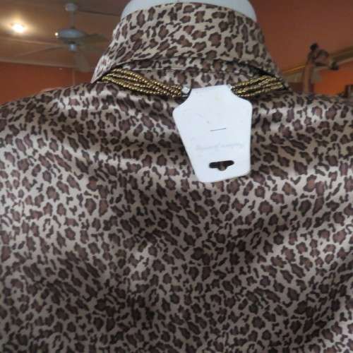 Animal print smart silky polyester long sleeve top in gold and brown colours. Size 40/16. As new.