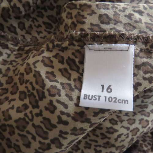 Animal print smart silky polyester long sleeve top in gold and brown colours. Size 40/16. As new.