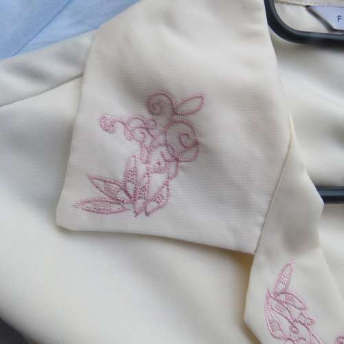 Rich cream long sleeve pyjama top with dainty pink embroidery. Size 32/8 by Foshini.New cond.