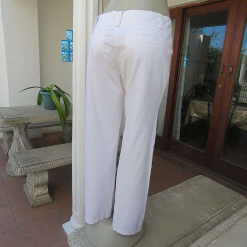 Cleverly designed white pants with flattering cut. Size 38/14 by WOOLWORTHS PERFECT. New cond.