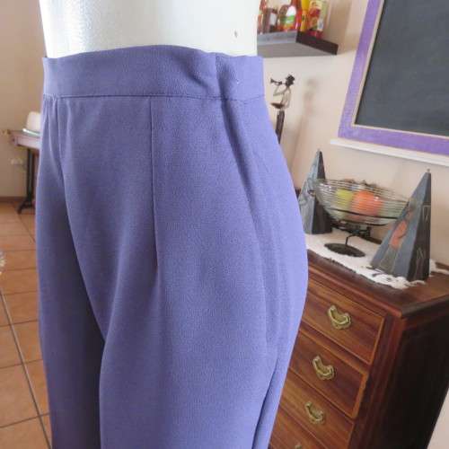 Fabulous high waist eggplant colour pants in size 34/10 by RITE DRESS. Zip at side. New condition.