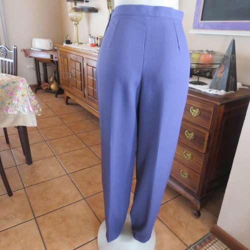 Fabulous high waist eggplant colour pants in size 34/10 by RITE DRESS. Zip at side. New condition.