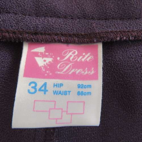 Fabulous high waist eggplant colour pants in size 34/10 by RITE DRESS. Zip at side. New condition.
