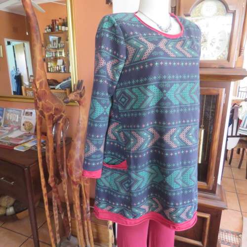 Ethnic look slip over long top in navy,jade and crimson colours, Size 36 to 38. New condition.