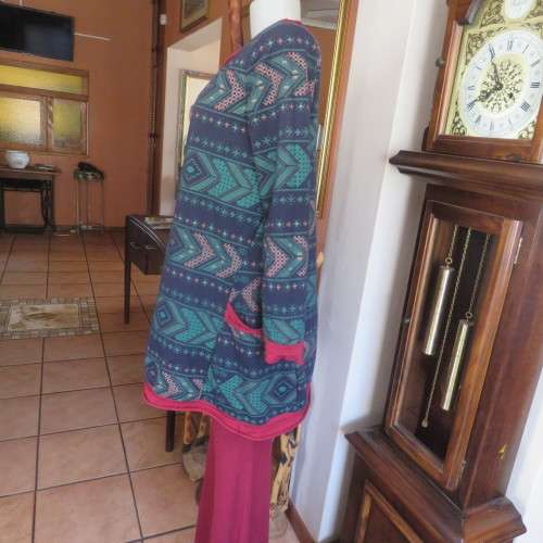 Ethnic look slip over long top in navy,jade and crimson colours, Size 36 to 38. New condition.