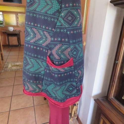 Ethnic look slip over long top in navy,jade and crimson colours, Size 36 to 38. New condition.