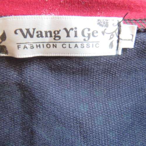 Ethnic look slip over long top in navy,jade and crimson colours, Size 36 to 38. New condition.