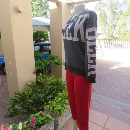 GEEK long sleeve grey top with white logo. Slip over.  Size 36/12. By Atmosphere. Good condition.