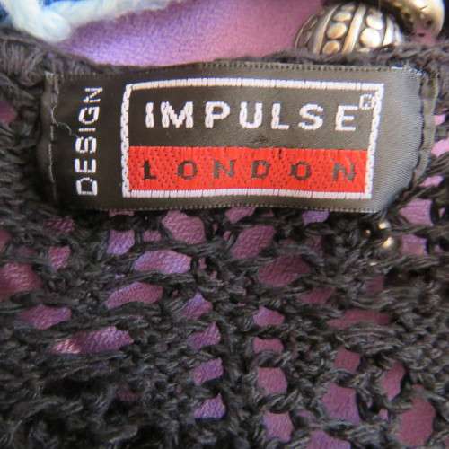 Eyecatching tiered skirt. Ankle length in sheer polyester. Size 40/16 by FASHION EXPRESS. As new.