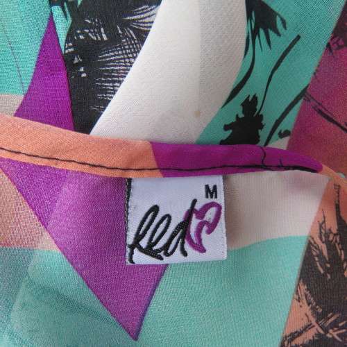 Chic sheer polyester sleeveless summer top with tropical print Size 34-10 By `RED` As new