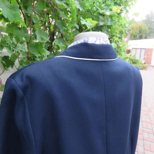 Fabulous navy long sleeve jacket Fully lined Round collar By `Topics` Size 40-16 New condition