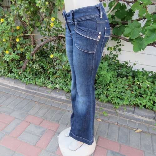 Fashion denim jeans in skinny kick flare. By `Island River Denim`. Size 31/8. New condition.