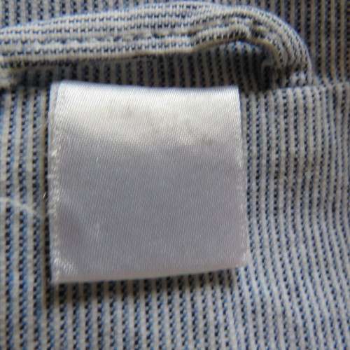 Chic tailored long sleeve jacket. In fine white and blue vertical stripes. Size 30/6. As new.