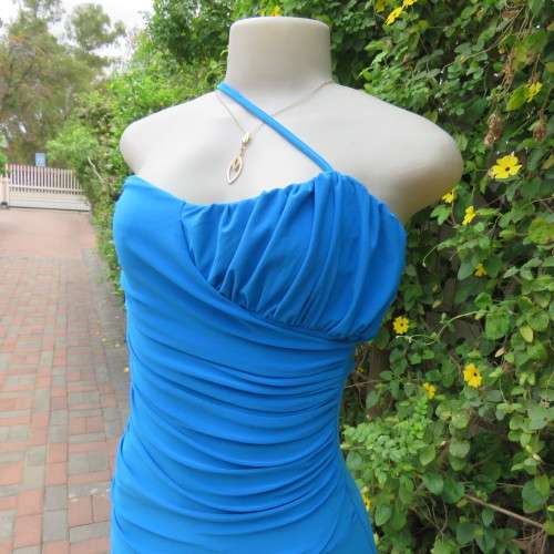 Magnificent long peacock blue evening dress made by boutique in Thailand. Size 34/10. New.