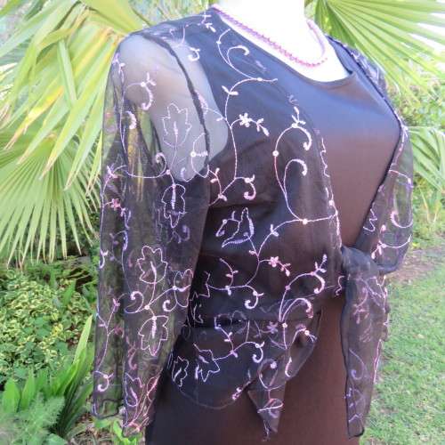 Glamorous black netting long sleeve bolero style cover-up by `St. Bernard` Size 38/14. New condition