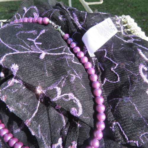 Glamorous black netting long sleeve bolero style cover-up by `St. Bernard` Size 38/14. New condition