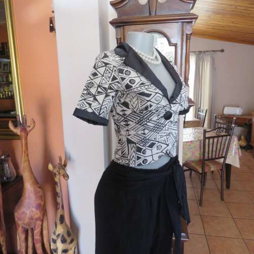 State of the art  cropped special occasion top. In size 30/6. Boutique made. New condition.