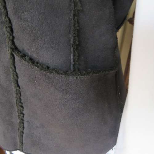 Warm black suede look  zip-up waistcoat. Polyester inner. Size 36/12 by `Woolworths`. New condition.