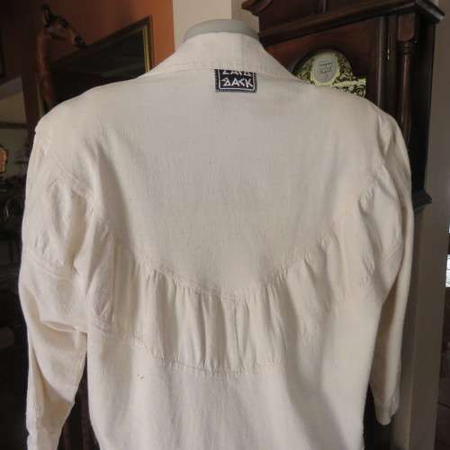 Striking long open jacket in natural textured cotton. By `Laid Back`. Size 34 to 38. New condition.