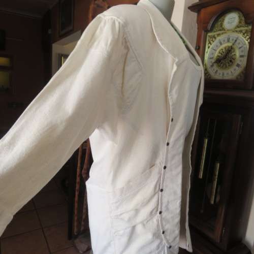 Striking long open jacket in natural textured cotton. By `Laid Back`. Size 34 to 38. New condition.