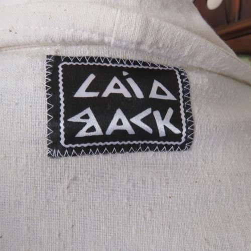 Striking long open jacket in natural textured cotton. By `Laid Back`. Size 34 to 38. New condition.