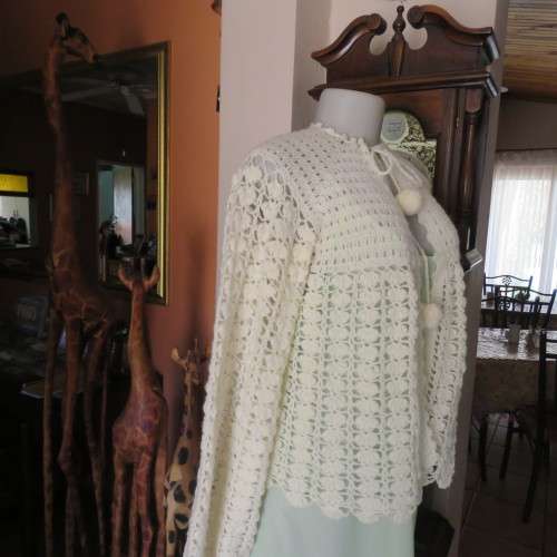 Feminine rich cream crochet bed jacket with long sleeves. Size 36/12 best fit. New condition.