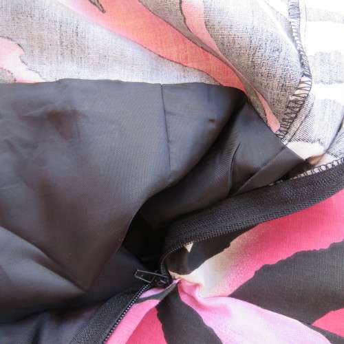 Up style sexy summer dress with pink, white and black print with belt. Size 34/10. New condition.