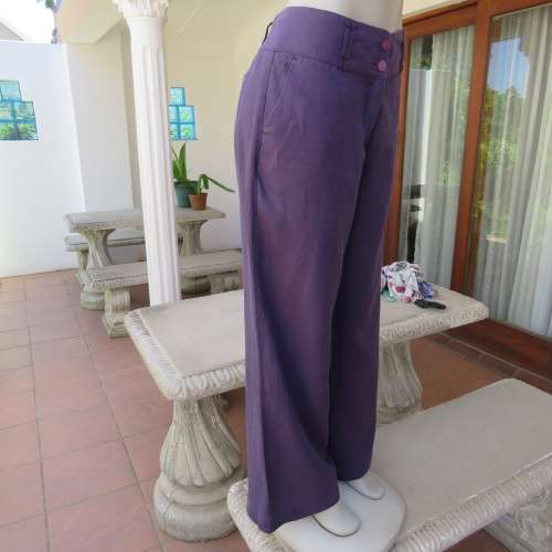 Wide legged pants by `Queenspark` in size 36/12. In 100% linen. Very dark purple. As new.