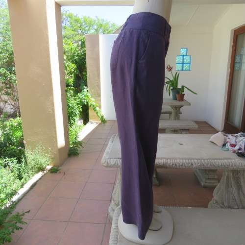Wide legged pants by `Queenspark` in size 36/12. In 100% linen. Very dark purple. As new.