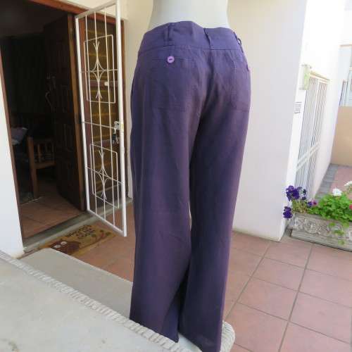 Wide legged pants by `Queenspark` in size 36/12. In 100% linen. Very dark purple. As new.