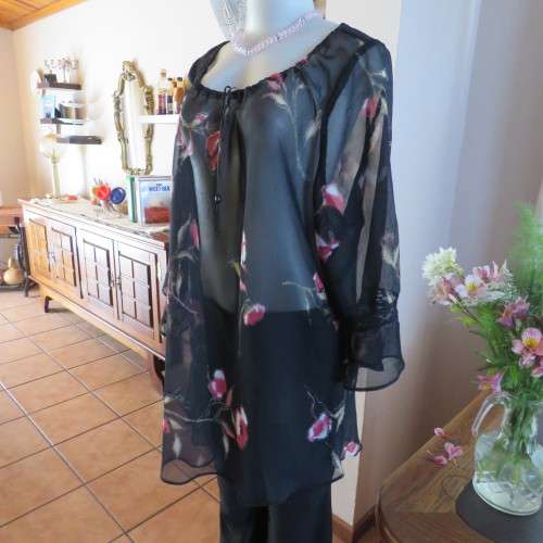 Sheer black top with pink floral pattern by `Topics` size 42/18. Used but fine for everyday use.
