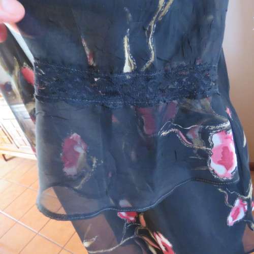 Sheer black top with pink floral pattern by `Topics` size 42/18. Used but fine for everyday use.
