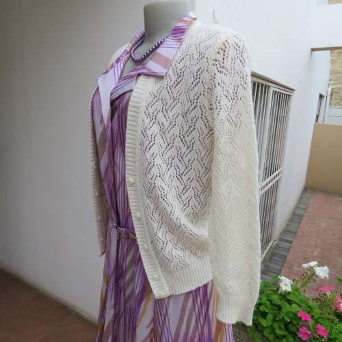 Lace pattern knitted cardigan in light cream colour by WOOLWORTHS in size 34/10. Very good cond.