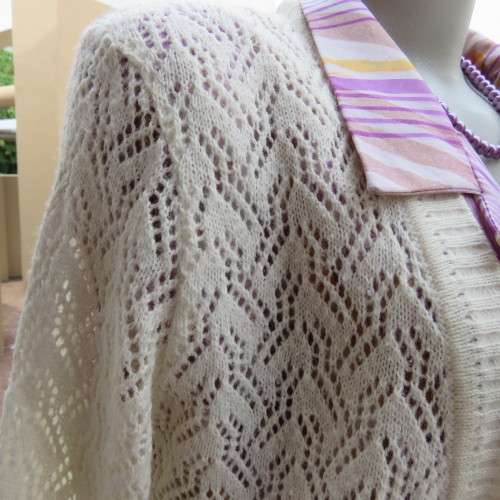 Lace pattern knitted cardigan in light cream colour by WOOLWORTHS in size 34/10. Very good cond.