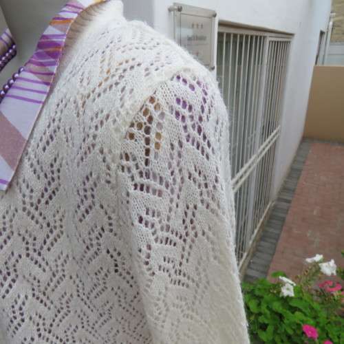 Lace pattern knitted cardigan in light cream colour by WOOLWORTHS in size 34/10. Very good cond.