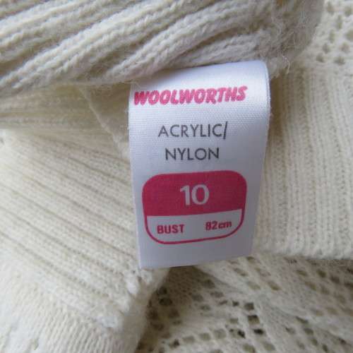 Lace pattern knitted cardigan in light cream colour by WOOLWORTHS in size 34/10. Very good cond.