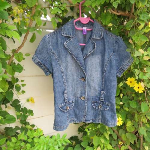 Capped sleeve blue denim jean jacket for 13 to 14 yr old girl.Two small dummy pockets. As new.