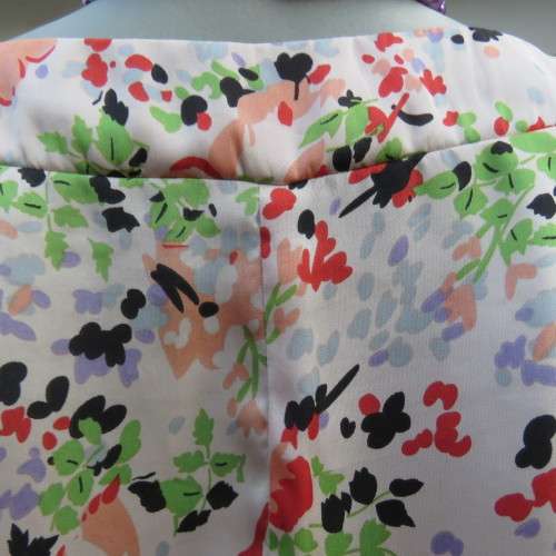 Blouson style top in soft and silky polyester with round banded neckline. Size 36/12 by EXACT