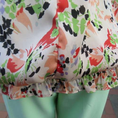 Blouson style top in soft and silky polyester with round banded neckline. Size 36/12 by EXACT