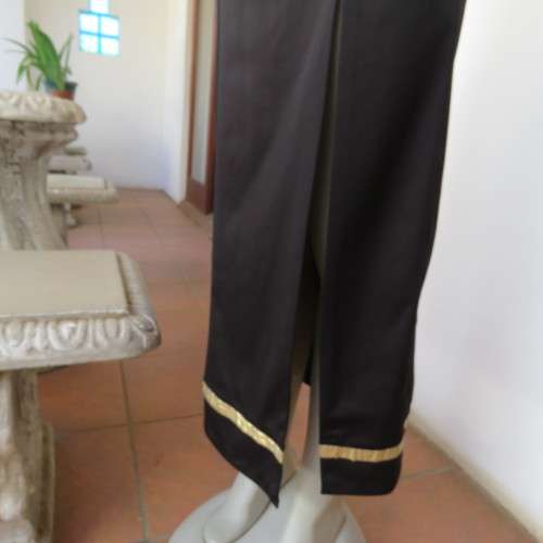 Elegant black evening dress in maxi lenght. Princess style front. Size 34/10. Made by `BOUTIQUE`.