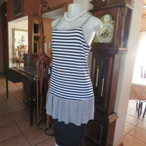 Sexy long strappy top in horizontal black + white stripes. Size 38/14 by `FV COLLECTION`.As new