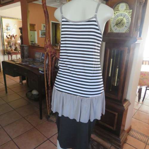Sexy long strappy top in horizontal black + white stripes. Size 38/14 by `FV COLLECTION`.As new