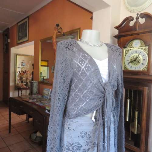 Grey bolero style acrylic knit long sleeve cardigan by `INSYNC` size 44/20. Good condition.