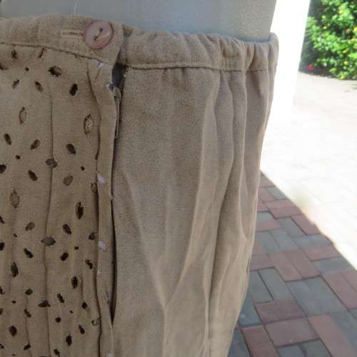 Stunning dark beige creased rounded ankle length skirt with asymetrical seamline size 42/18. As new.