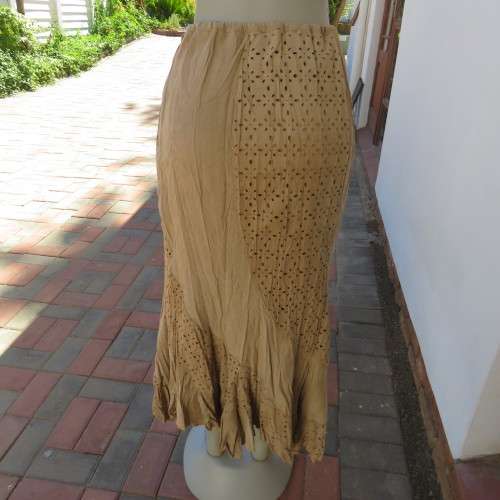 Stunning dark beige creased rounded ankle length skirt with asymetrical seamline size 42/18. As new.
