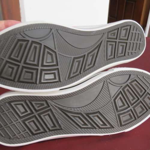 As new red high top tekkie by ATMOSPHERE in size 38/5. With white front and soles. Never used.