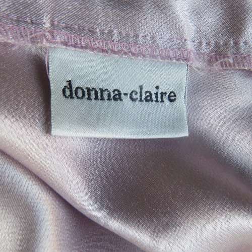 High quality glamour 2 piece skirt and long sleeve jacket by DONNA-CLAIRE size 46/22. As new in pink