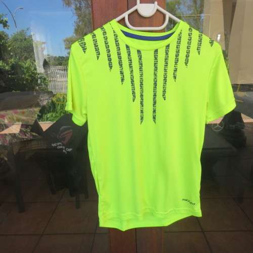 Neon yellow short sleeve sport T-shirt for boy 13 to 14 year old. By MAXED. As new.